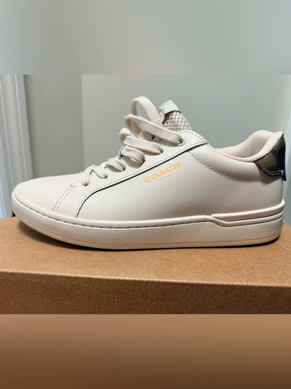 Coach Cream Leather Low-Top Sneakers with Subtle Gold Logo